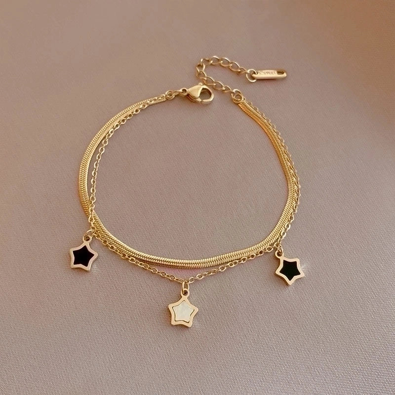 Bracciale con doppia catenina con stelle in Acciaio al Titanio